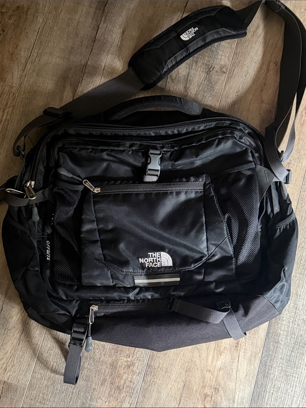 The North Face Black Messenger Bag with Padded Shoulder Strap